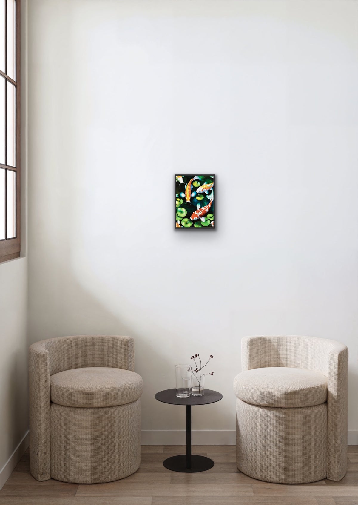 A small 8 x 10 colorful framed in black floating frame canvas wall art print depicting koi fish.