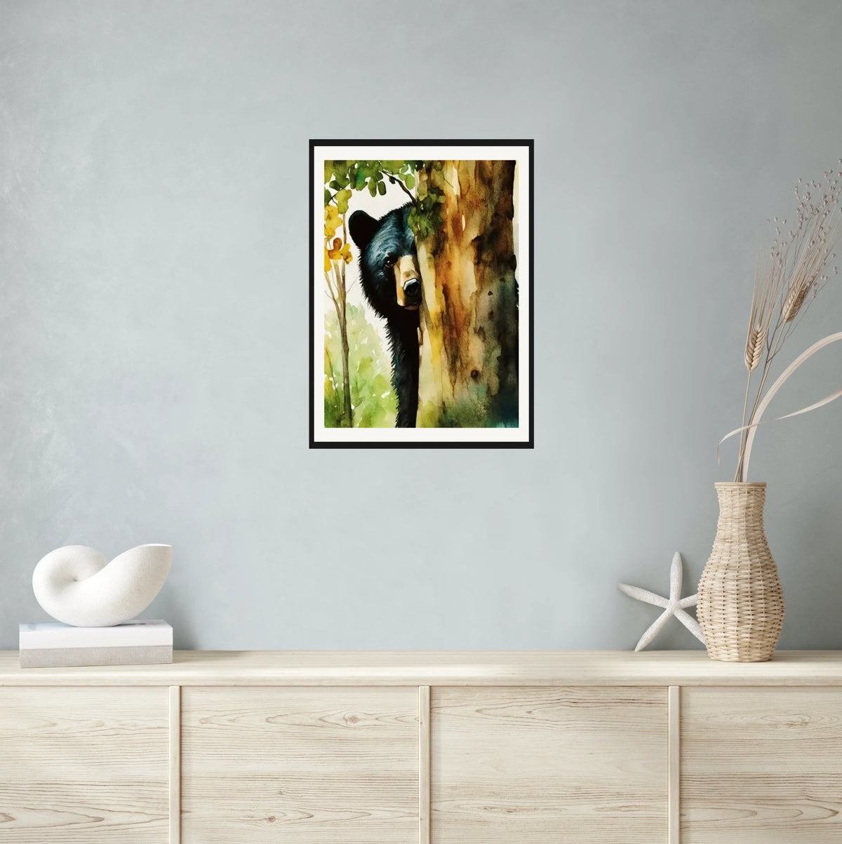 Black Bear Peeking from Behind a Tree in Fall - large 24 x 36 matted and framed art print shown hanging on a wall