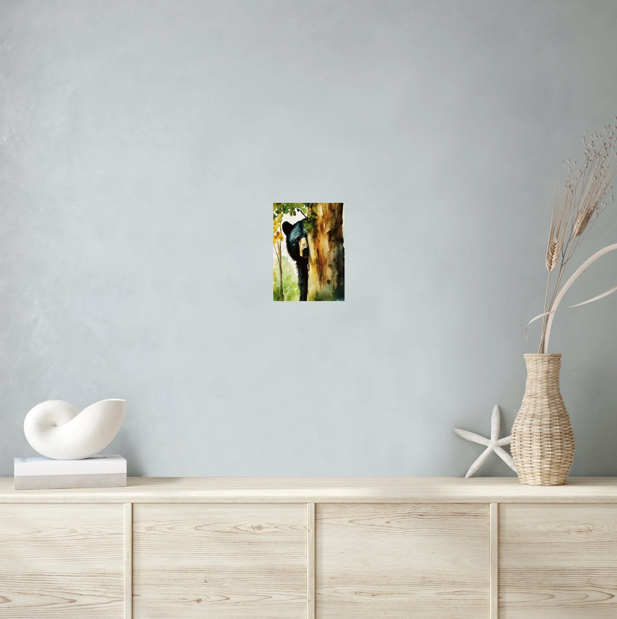 Black Bear Peeking from Behind a Tree in Fall - medium 12 x 16 unframed art print shown hanging on a wall