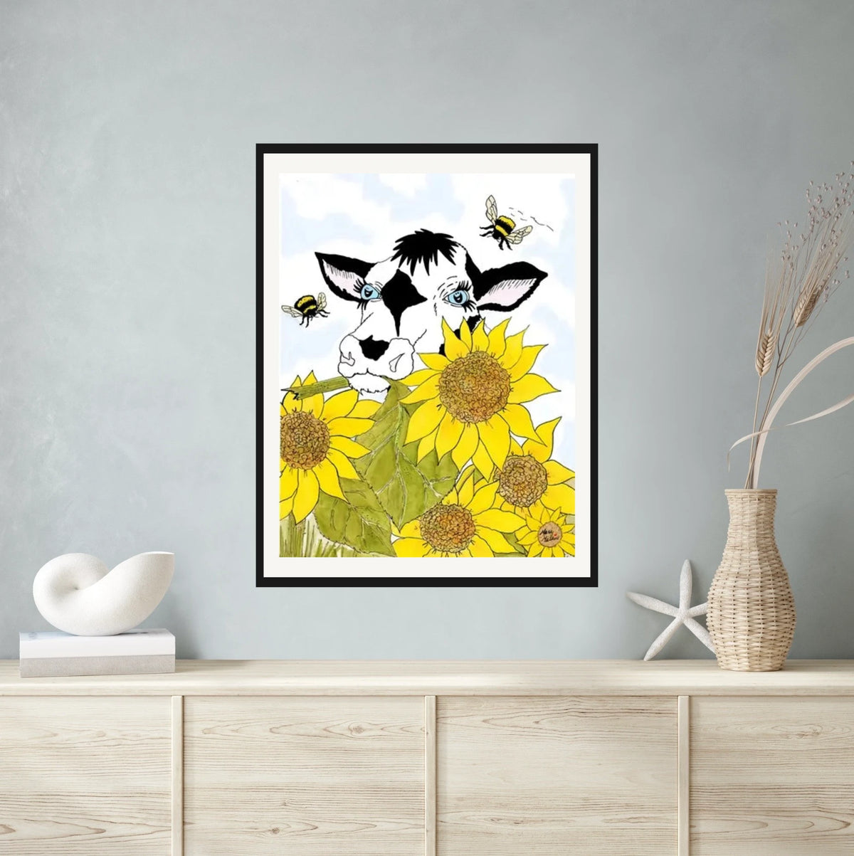 Bella Cow Among Sunflowers - extra large 36 x 48 matted and framed art print shown hanging on a wall
