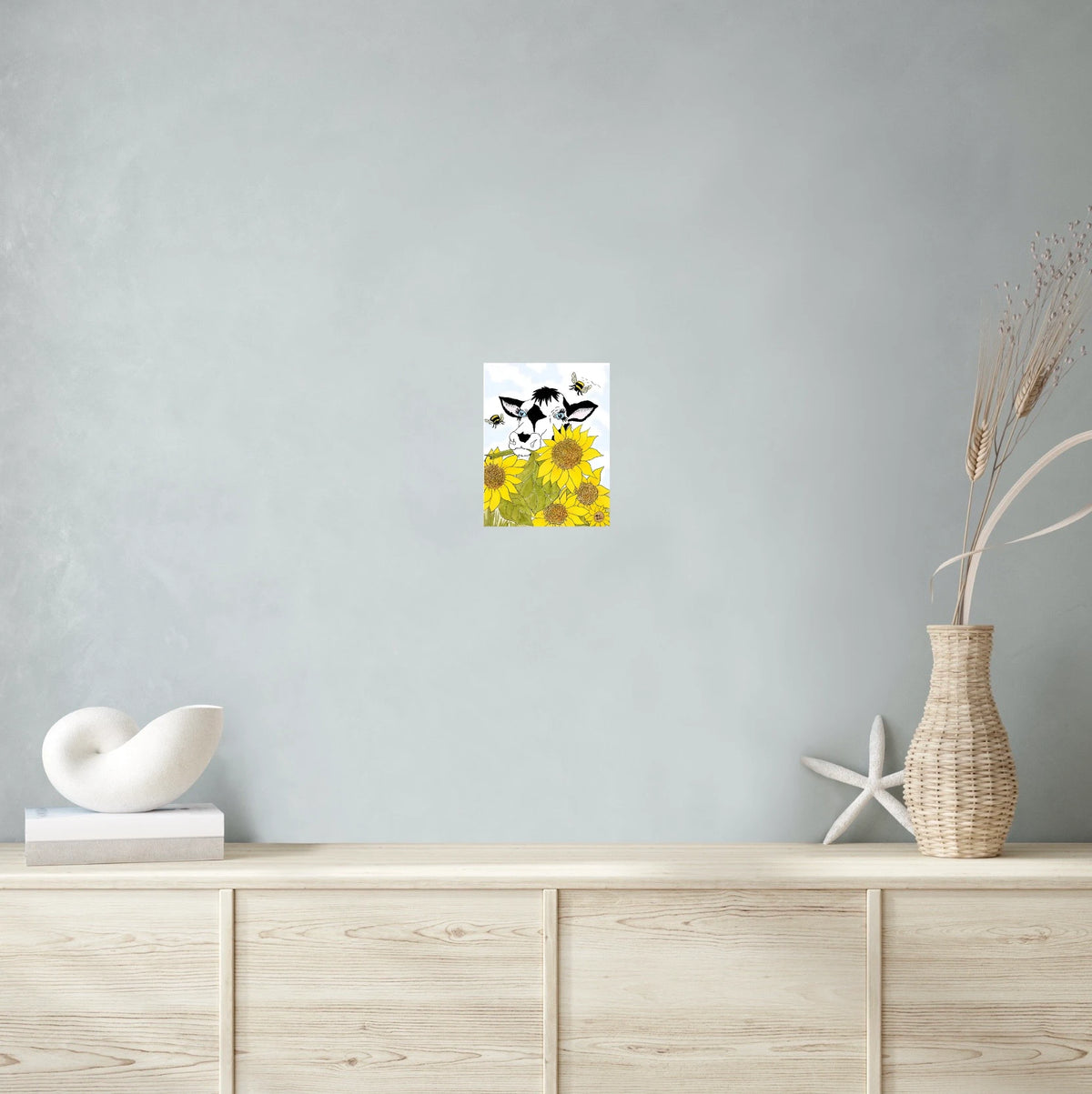 Bella Cow Among Sunflowers - medium 12 x 16 unframed art print shown hanging on a wall