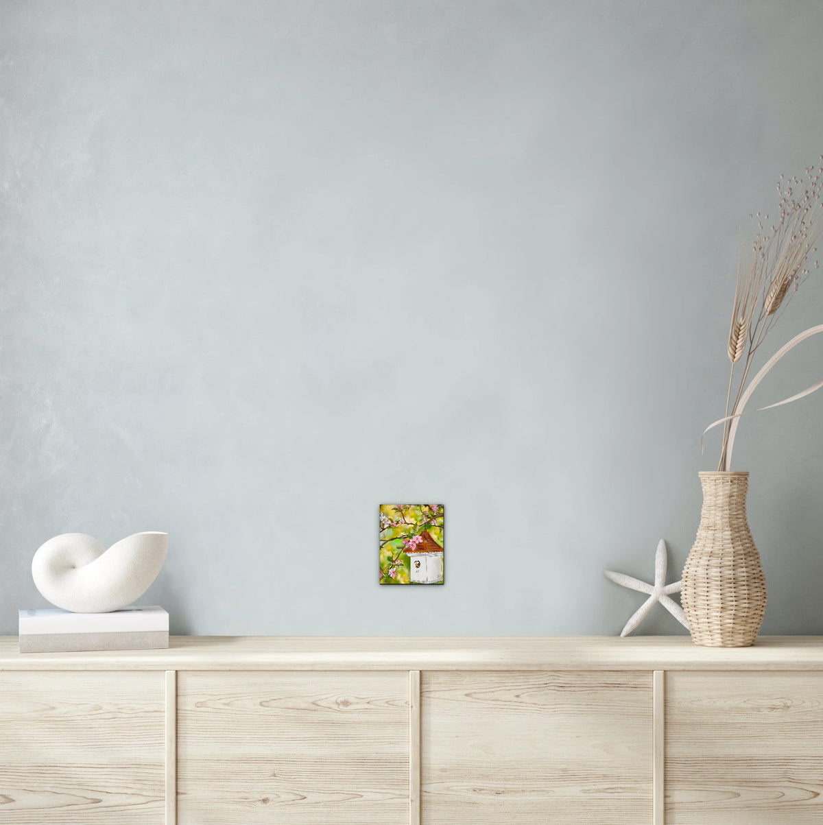 Cherry Blossoms and Birdhouse - small 8 x 10 unframed art print shown hanging on a wall