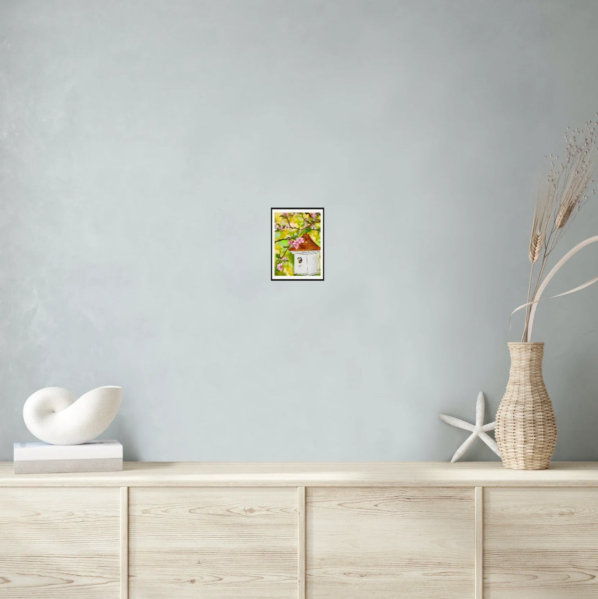 Cherry Blossoms and Birdhouse - small 8 x 10 matted and framed art print shown hanging on a wall