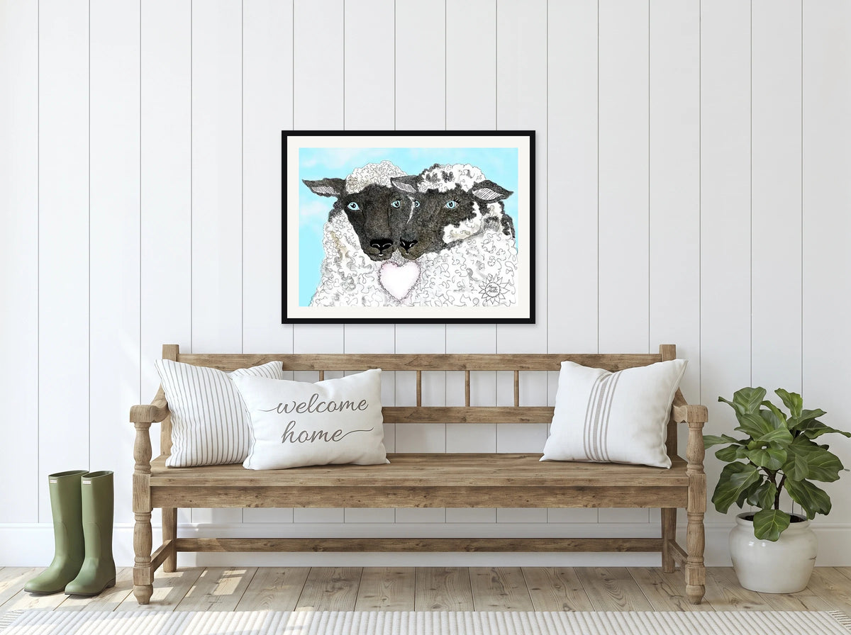 This is a large 24 x 36 matted and framed watercolor art print of two sheep, one black-faced and one white, cheek to cheek above a heart. Created by professional artists, this high-quality watercolor print on textured matte paper adds a touch of character to any home or office decor.