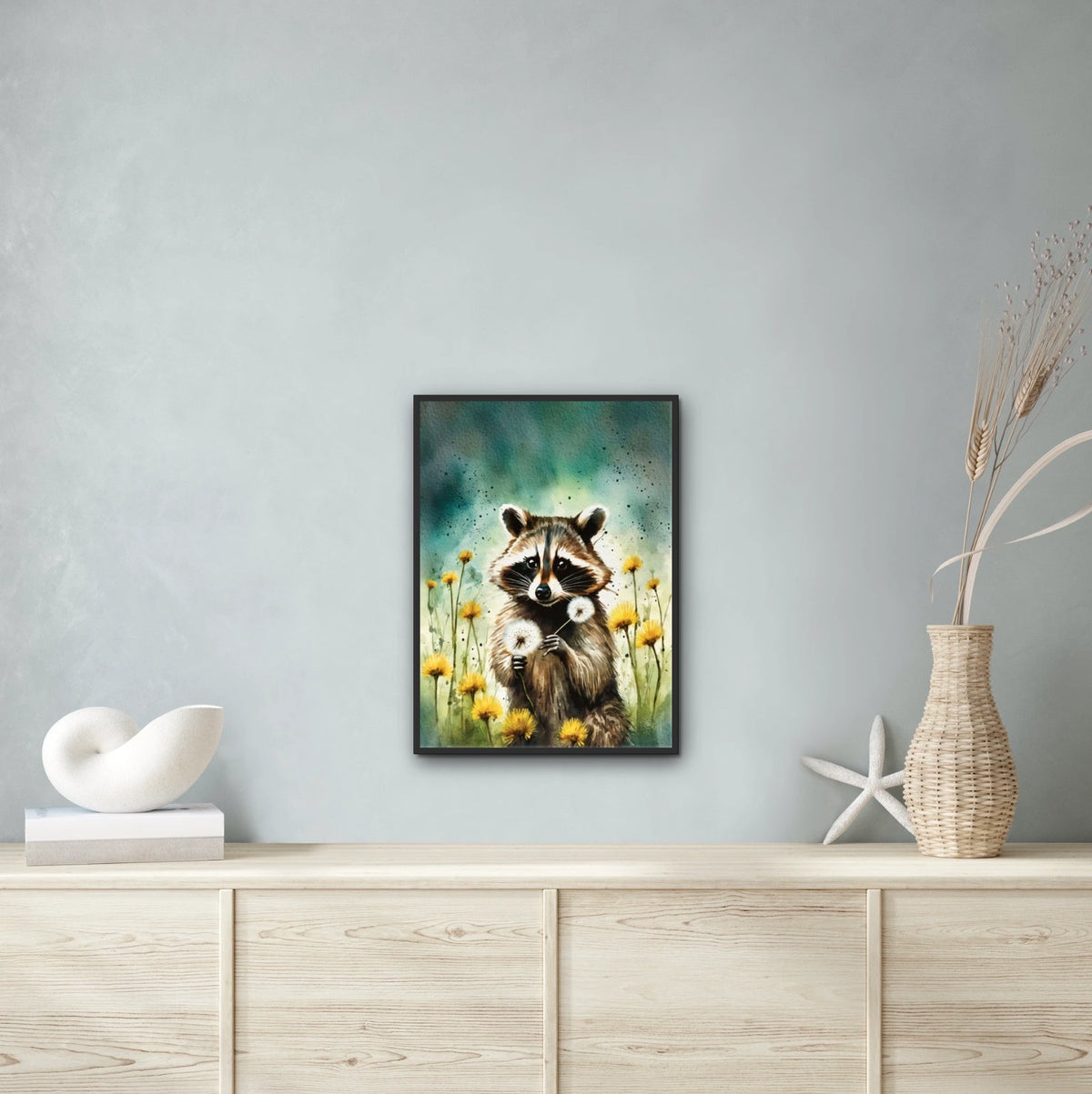 Raccoon Among Dandelions - large 24 x 36 framed art print shown hanging on a wall