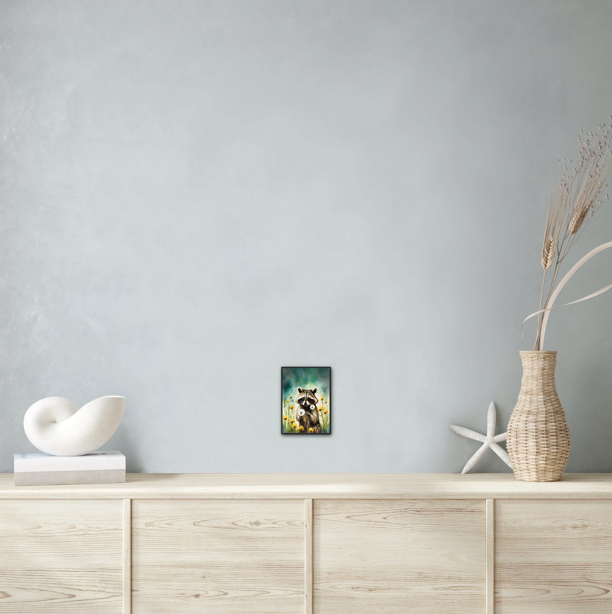 Raccoon Among Dandelions - small 8 x 10 framed art print shown hanging on a wall