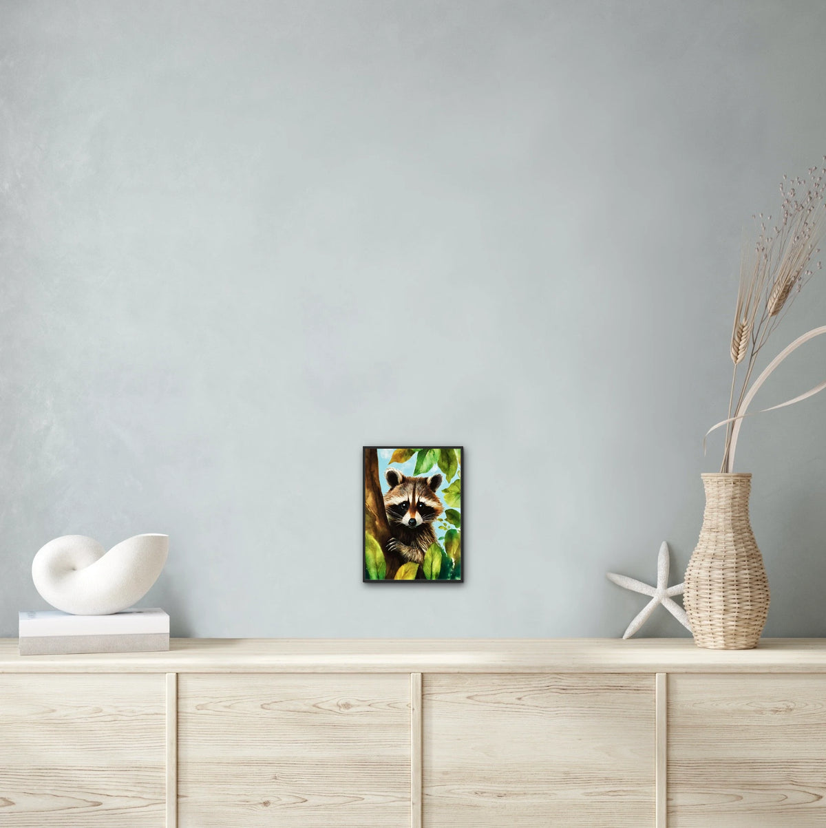 Raccoon Tree Sitter - medium 12 x 16 framed art print shown hanging on a wall