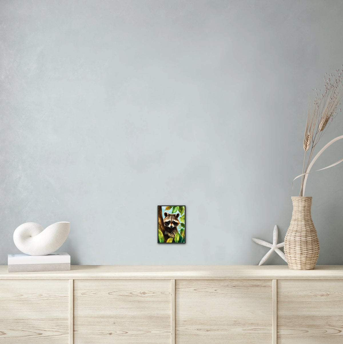 Raccoon Tree Sitter - small 8 x 10 framed art print shown hanging on a wall