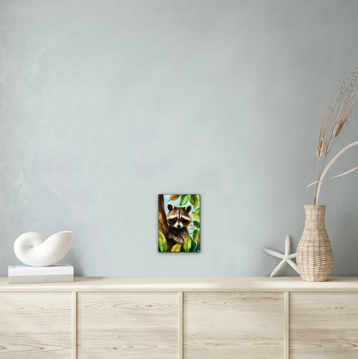 Raccoon Tree Sitter - medium 12 x 16 unframed art print shown hanging on a wall