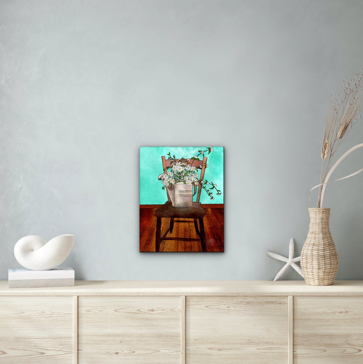 Sprinkling Can and Daisies - large 24 x 36 unframed art print shown hanging on a wall