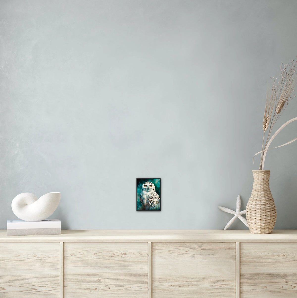 Staring Snow Owl - small 8 x 10 framed art print shown hanging on a wall